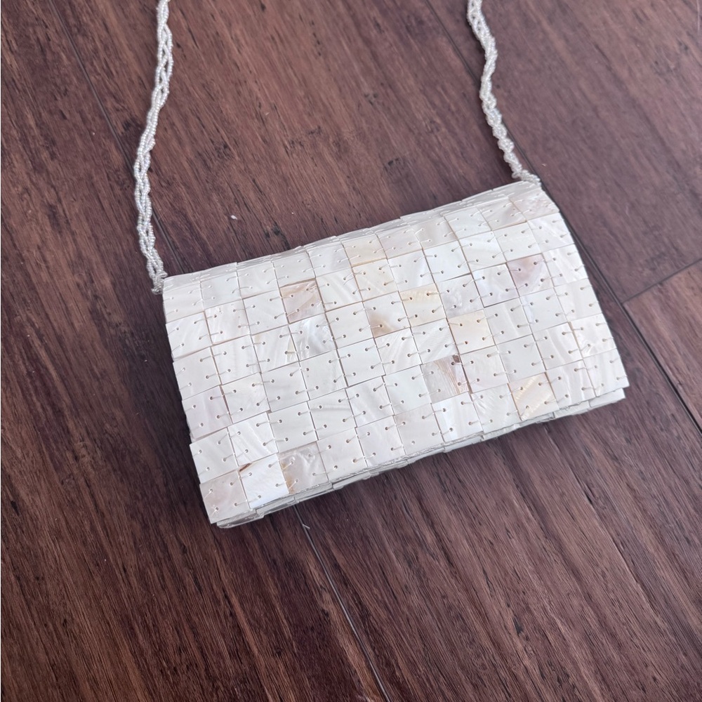 Elegant Cream Woven Clutch